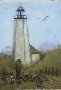 A man feeds birds near a lighthouse.