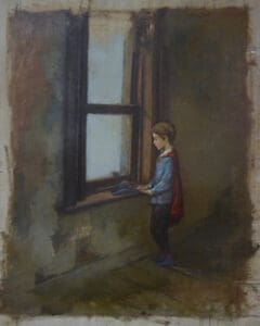 A child in a cape looks out a window.