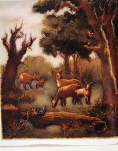 A herd of deer in a forest clearing.